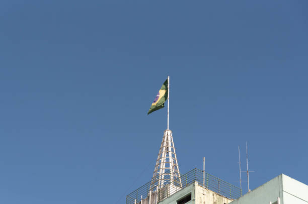 Brazil's flag. Blue natural background. Symbol. Object. Pavilion. Symbol of the republic. Streamer. Flag of the Federative Republic of Brazil.