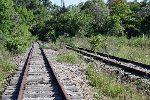 istock Vintage railroad and rusty rails. Abandoned railway station 1287262267