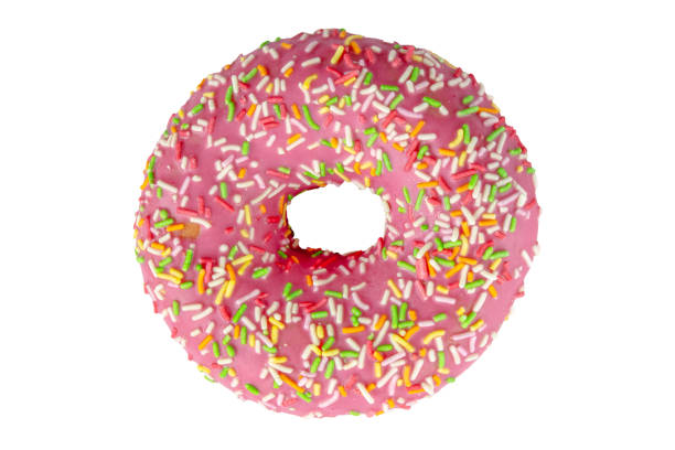 istock Pink Doughnut cut out standing on white background 1287263736