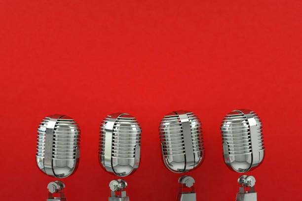 istock Retro Old Microphone, Vintage Style, Red Background 1287264624