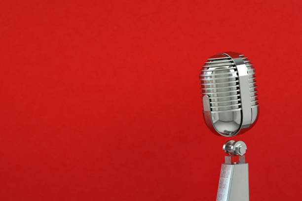 istock Retro Old Microphone, Vintage Style, Red Background 1287264820
