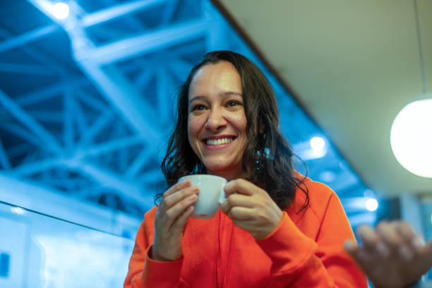 istock Happy woman having a coffee 1287265487