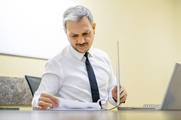 istock Businessman working at his office 1287267933