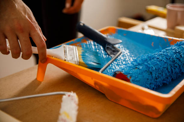 istock Painting the walls blue 1287268178