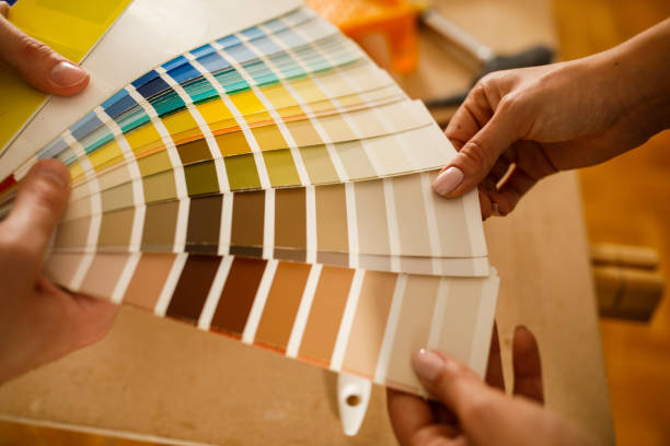 istock Choosing a shade for the paint while renovating 1287268501