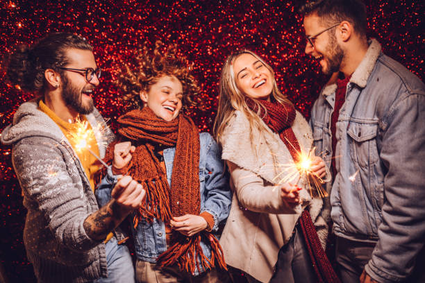 istock Celebrating New Year with sparklers 1287269788