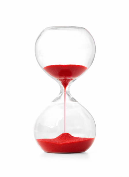 istock Beautiful hourglass isolated on white with red sand 1287269913