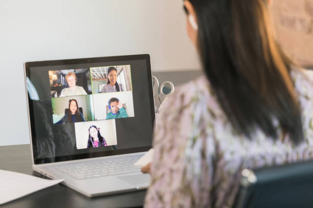 istock Unrecognizable teacher works with students online during COVID-19 1287276064