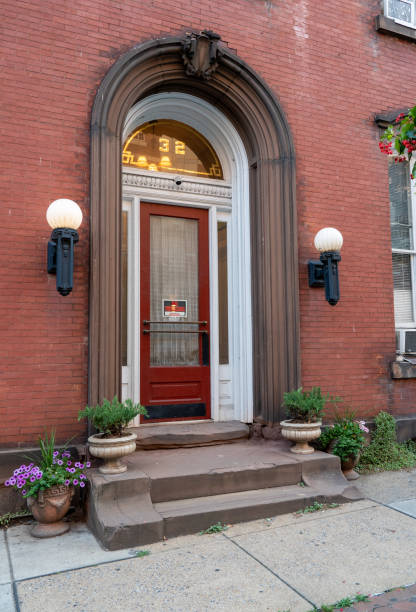 istock Ornate Door in Brick Wall 1287276980