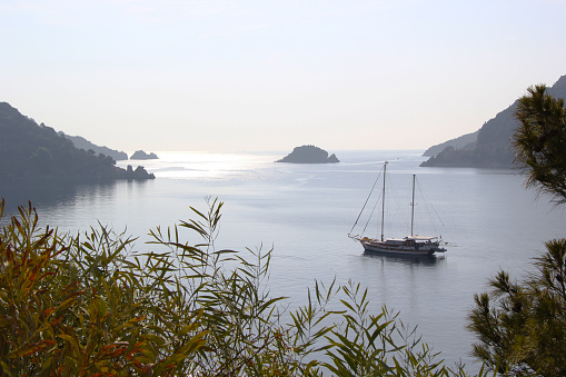 Mountains and the boat from icmeler in Marmaris, Turkey.