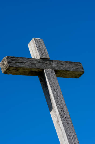 istock Wooden Cross and Blue Sky 1287282213
