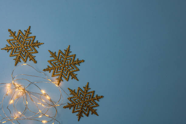 istock Decorated Christmas background with christmassy ornaments and decorations. Top view with copy space Christmas composition. 1287283002