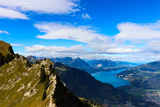 istock Scenic View of mountains (Niesen) and lake Thun (Thunersee). 1287287026