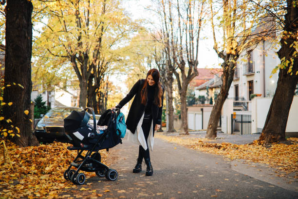 istock Mom going out for a walk with her baby boy 1287287463