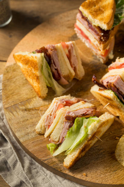 istock Homemade Turkey Club Sandwich 1287287854