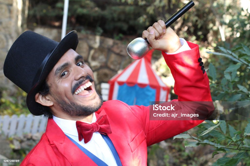 Charismatic ethnic ringmaster in the circus Charismatic ethnic ringmaster in the circus. Ringmaster Stock Photo