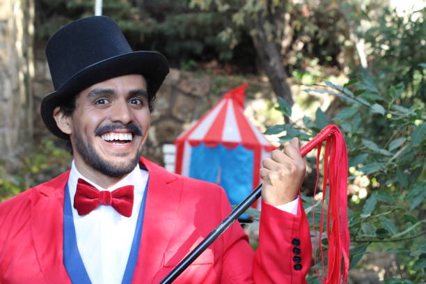 istock Charismatic ethnic ringmaster in the circus 1287288221