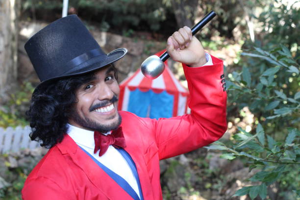 istock Charismatic ethnic ringmaster in the circus 1287288223