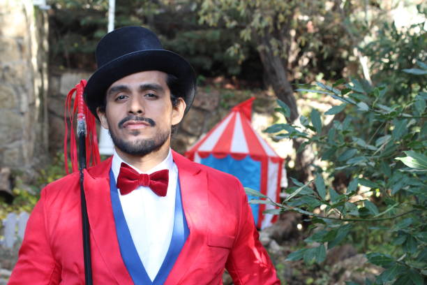 istock Charismatic ethnic ringmaster in the circus 1287288239