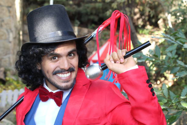 istock Charismatic ethnic ringmaster in the circus 1287288291