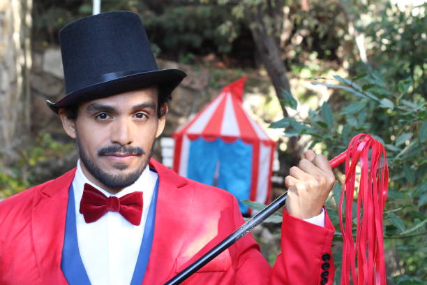 istock Charismatic ethnic ringmaster in the circus 1287288296