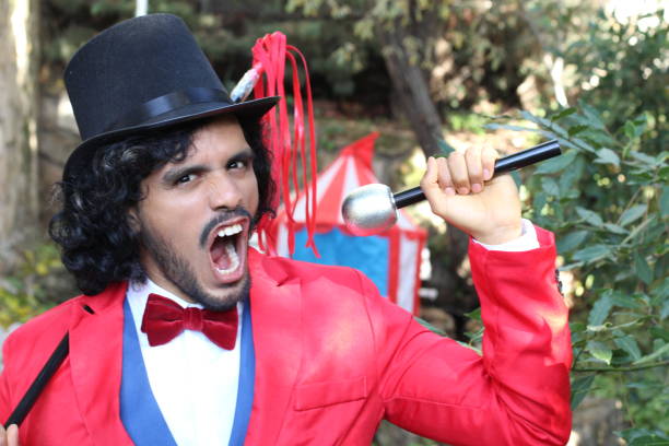istock Charismatic ethnic ringmaster in the circus 1287288379