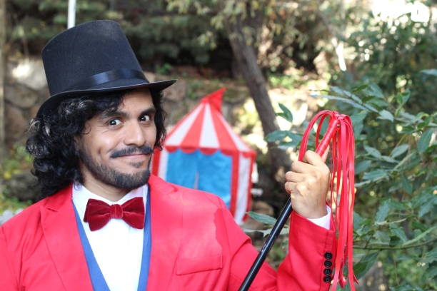 istock Charismatic ethnic ringmaster in the circus 1287288486