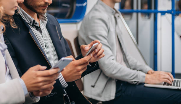 istock young couple communicates sitting in a subway car 1287289806