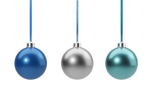 Christmas balls isolated on white background. Set of three falling green christmas ornaments.