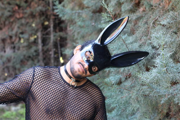 istock Attractive man wearing bunny mask 1287290965