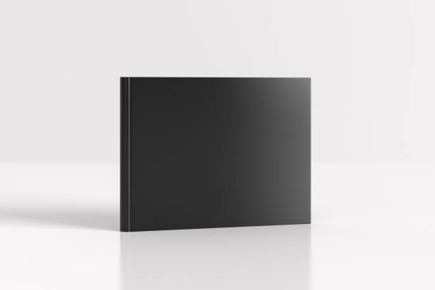 istock Hardcover horizontal or landscape black mockup book standing on the white background. 1287291172