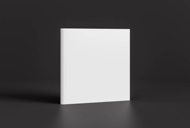 istock Hardcover square white mockup book standing on the black background. 1287291878