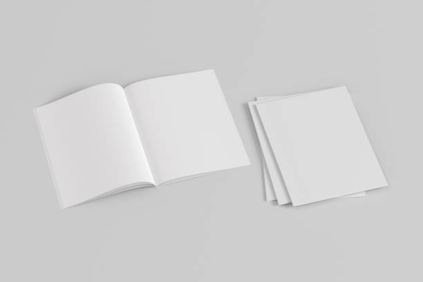 istock Stack of closed and open vertical magazine or brochure  mockup on white background. 1287291917
