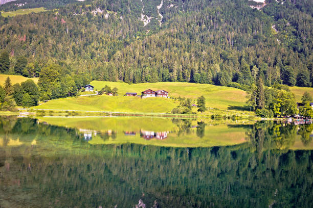 istock Bavarian Alps lake reflection, Hintersee lake in Berchtesgaden Alpine landscape mirror view 1287292685