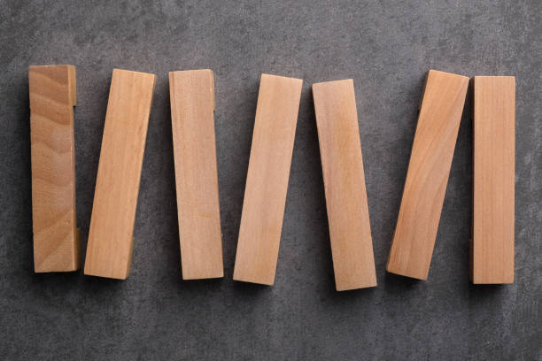 istock Blank Wooden Blocks And Red Cubes On Gray Background 1287294558