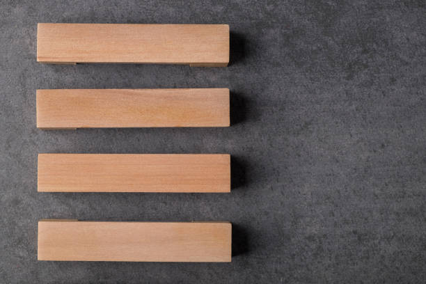 istock Blank Wooden Blocks And Red Cubes On Gray Background 1287294818