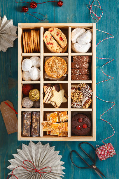 istock Christmas Shortbread Biscuits Cookies Assortment. Holiday Cookie Box. Assorted Christmas homemade cookies in wooden box. Sweet biscuits in a big wooden box. Christmas dessert table. Gift idea 1287294821