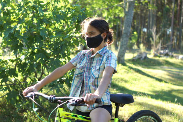 istock girl on a bike 1287294847