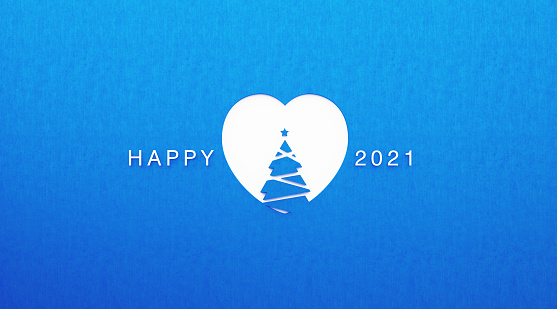 White cutout heart shape with Christmas tree inside and Happy 2021 message over blue background. Horizontal composition with copy space. Happy new year and Christmas concept.