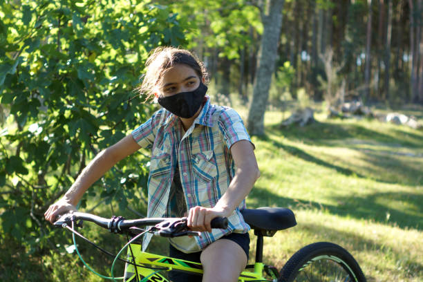 istock girl on a bike 1287294858