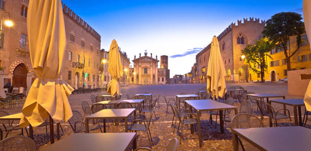 istock Mantova city Piazza Sordello cafe and architecture dawn view 1287296401