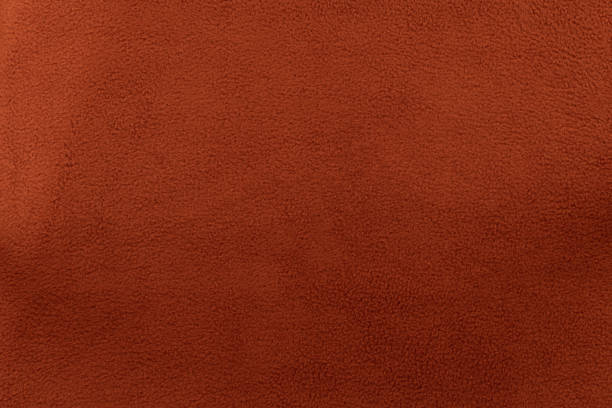 istock Vivid brown and soft fabric background 1287297467