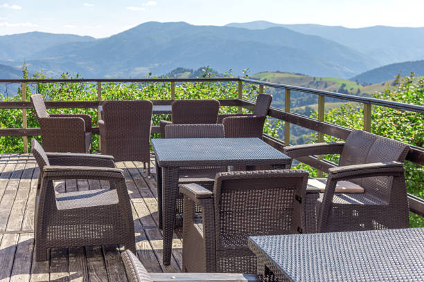 istock Terrace with tables and chairs with beautiful mountain views. Cafe terrace. 1287299401