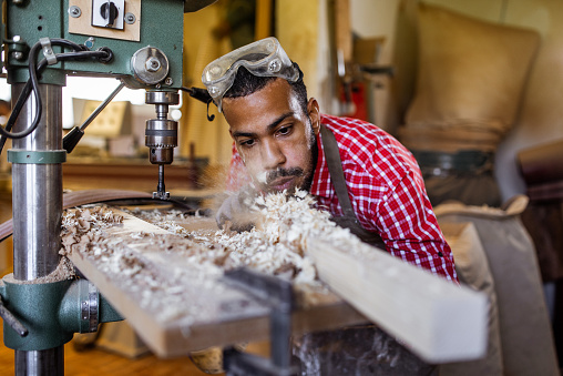 Carpenter working at his studio