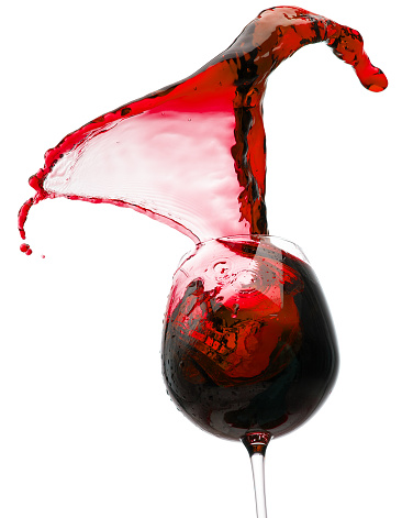 red wine splash from glass isolated on a white background.