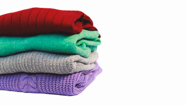 istock Pile of color woolen sweaters. 1287306934