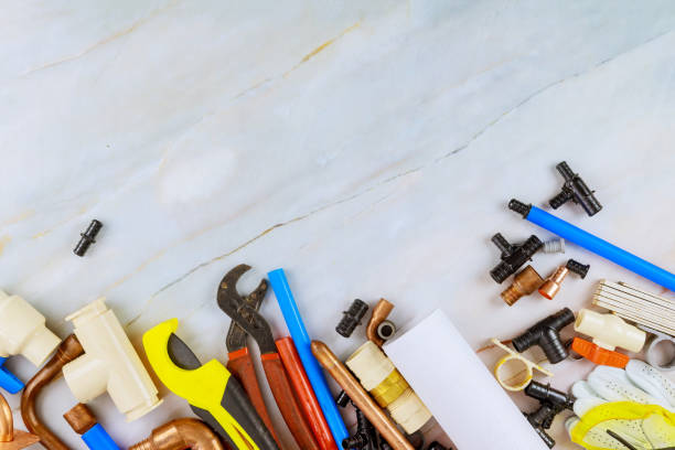 istock Working plumbing tools different wrenches, pipe, tube, fittings connectors 1287310464