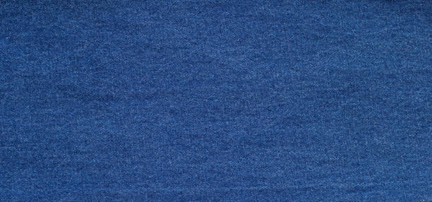 istock Close up of blue jeans texture  background. 1287311183