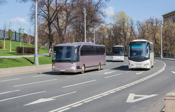 istock Tourist buses move along the street 1287311441
