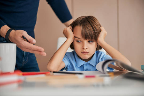 istock Getting bad mark and hearing disappointed father again 1287312595